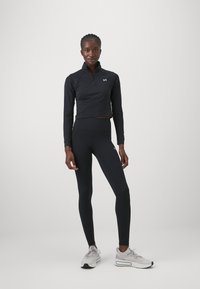 Under Armour VANISH SEAMLESS 1/4 ZIP CROP - Top dugih rukava - black/white