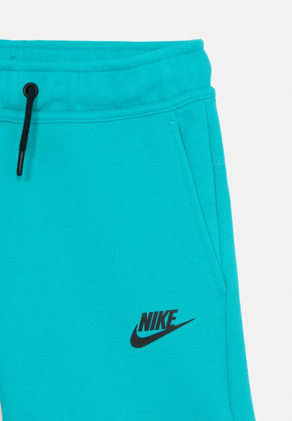 TECH UNISEX - Shorts2