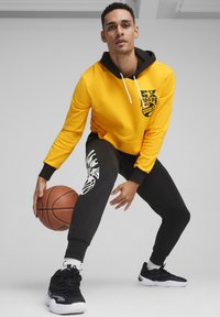 Puma POSTERIZE 2.0 - Jersey con capucha - yellow sizzle black