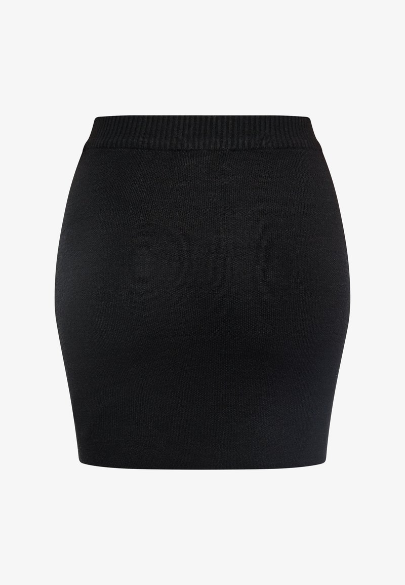 Černá pletená mini sukně s žebrovaným pasem. Hladká textura a přiléhavý střih, navržená pro těsné nošení. Bez dalších ozdob.