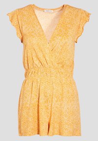 Combinaison courte jaune avec un col en V, des manches courtes à volants, une taille élastique et un motif texturé de petites taches blanches.