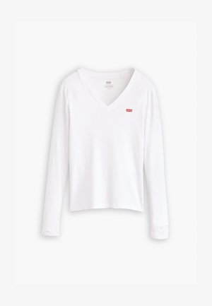 T-shirt branca de manga longa com decote em V, feita de algodão. Apresenta um pequeno logotipo vermelho da Levi's no lado esquerdo do peito. Textura lisa, corte padrão.