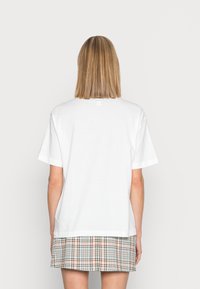 Monki T-shirt estampada - white light/pasteldolphine