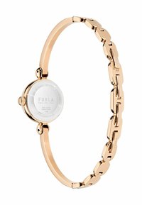 Orologio in acciaio inossidabile rosa con cassa rotonda, bracciale liscio e chiusura con logo embossato, che mostra un design minimalista.