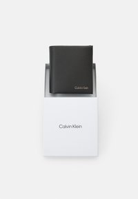 Calvin Klein CONCISE TRIFOLD UNISEX - Wallet - black