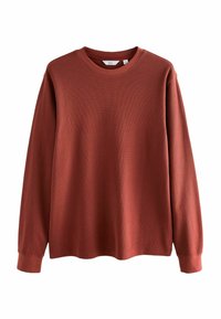 Rustfarvet sweatshirt med lange ærmer, tekstureret mønster, ribbet halsudskæring og manchetter. Lavet af blødt, strækbart materiale for komfort.