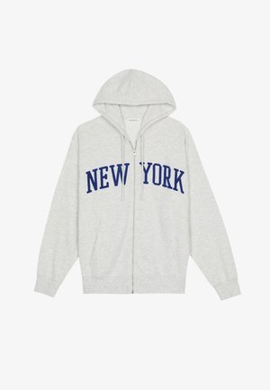 Gray zip-up hoodie with a large "NEW YORK" printed in navy blue across the chest, featuring a drawstring hood and front pockets.