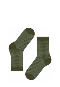 Calze verdi con un motivo a griglia testurizzata, con accentuazioni verde scuro contrastanti sulla punta e sul polsino. Realizzate in un tessuto morbido.