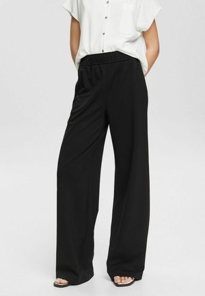 MIT ELASTISCHEM BUND - Broek - black