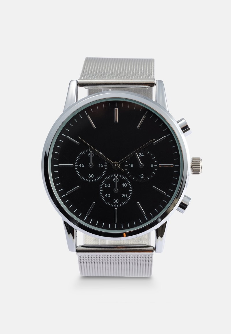 Silver metal wristwatch with a black dial, three subdials, silver hour markers, and a textured silver mesh strap.