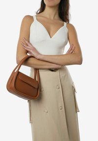 Miriade ROLLER - Borsa a mano - cuoio