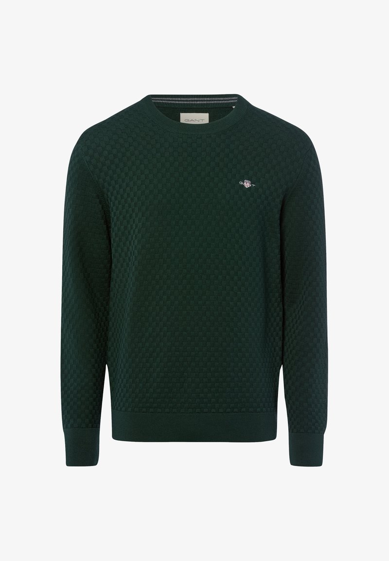 Pull en maille vert foncé à manches longues avec col rond et petit logo brodé sur la poitrine gauche.