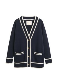 Navy cardigan with white trim, V-neck, gold buttons, and two front pockets. Made from a soft knit material; relaxed fit.