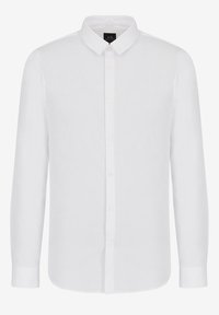 Camisa blanca de manga larga con botones, hecha de tejido ligero. Presenta un cuello clásico, cierre frontal con botones y un dobladillo recto con puños.