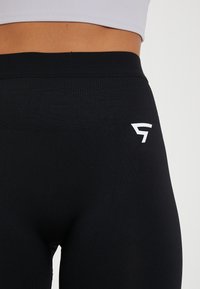 SQUATPROOF Pajkice – hlače - black