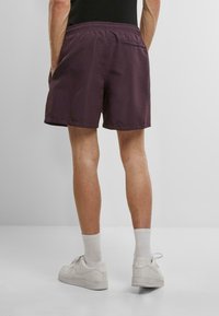 MJ Gonzales Badeshorts - plumpurple