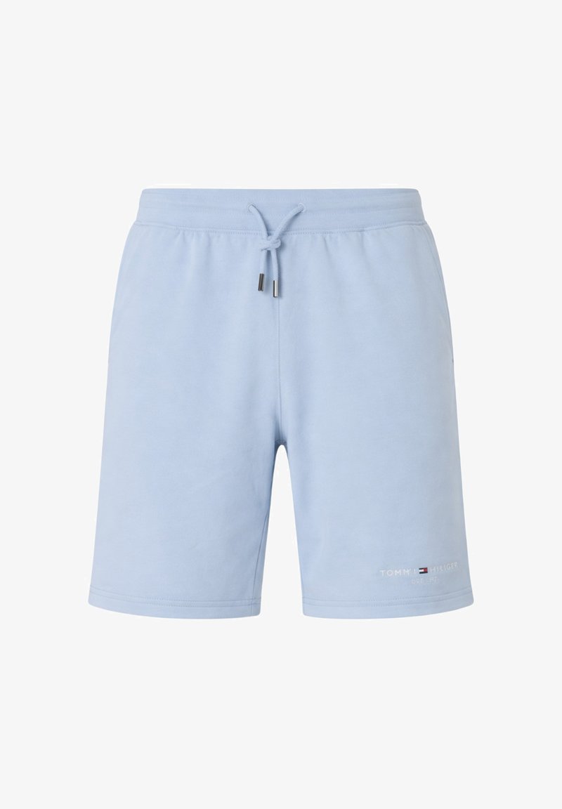 Shorts décontractés bleu clair avec taille élastique et cordon de serrage, arborant un petit logo Tommy Hilfiger sur la partie inférieure de la jambe gauche.