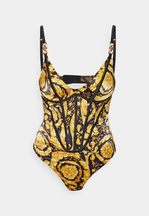 Juoda ir auksinė bodysuit su gėlių raštais, plonomis petnešomis ir auksinės spalvos detalėmis. Strukturizuotas dizainas su išpjova nugaros dalyje.