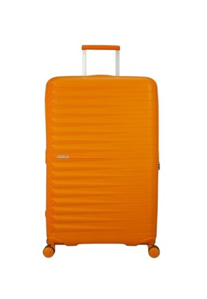 Hard-shell suitcase in bright orange with a ridged texture, retractable handle, and four rolling wheels for easy maneuverability.