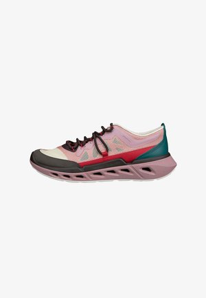 Lightweight athletic shoe in pink, red, black, and green with breathable mesh, unique sole ventilation, and black laces against white background.