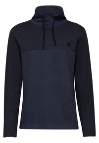 Námořnický svetr s vysokým límcem, kontrastní texturovanou panelem, nastavovací černou šňůrkou a kruhovým logem na hrudi.