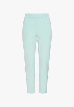 Pantalones de corte ajustado en verde menta claro, con una textura suave y sin elementos metálicos ni patrones visibles.