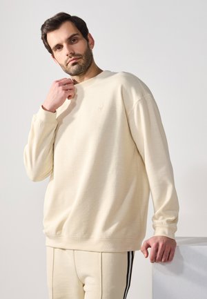 - Bluza