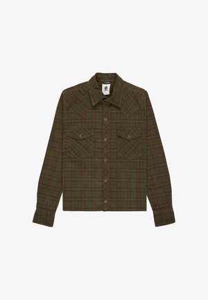 Green and brown plaid long-sleeve shirt with pointed collar, snap buttons down front, and two flap chest pockets with snap closures.