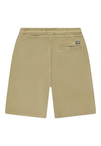 Beige katoenen shorts met een elastische tailleband, een achterzak en minimale stiksels aan de zijkanten. Relaxte pasvorm en knielengte.