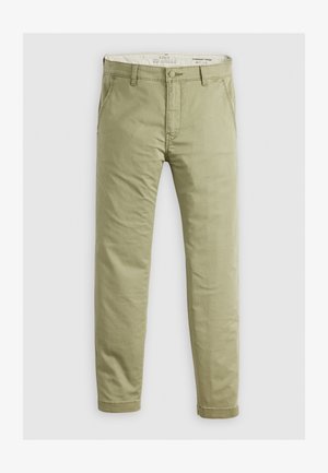 Lichtgroene chino broek van katoen, met een knoopsluiting, voorzakken en een tapered fit. Soepele textuur met minimale details.