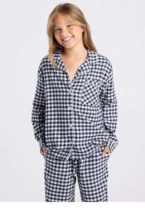 Navy and white checkered pajama set featuring long sleeves, a pocket, and button-down front. Soft fabric with relaxed fit and matching pants.