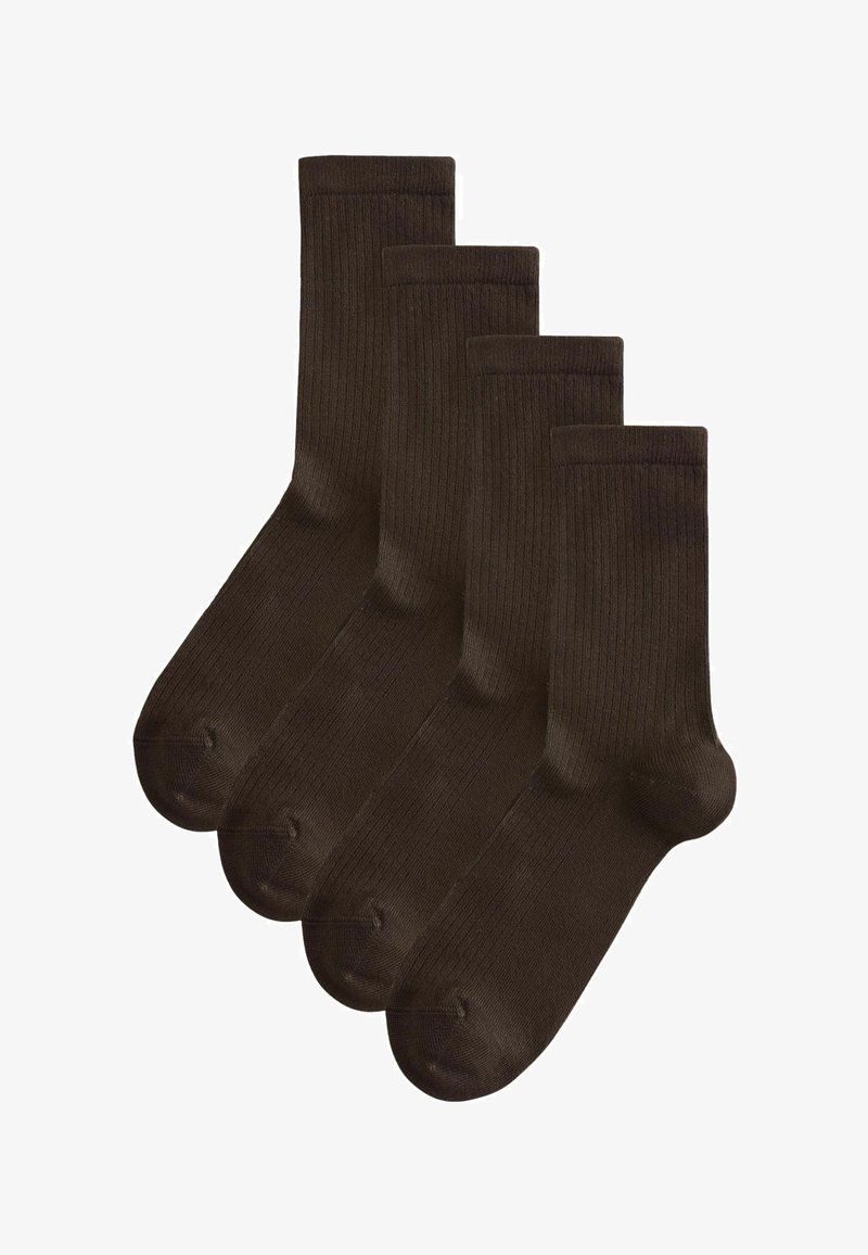 Quatre chaussettes courtes côtelées marron foncé disposées en chevauchement sur un fond blanc.