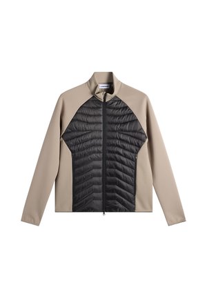 Beige og sort fuld-zip jakke med quiltet sort frontpanel og glatte beige ærmer og skuldre, stående krave, ingen synlige logoer.