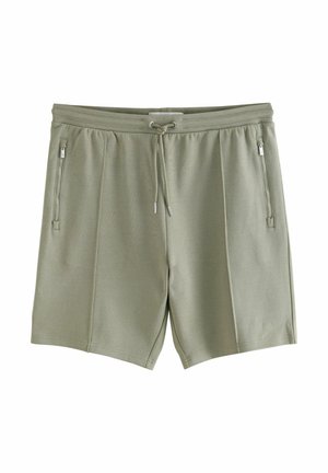Svetlozeleni šortsi narejeni iz mehkega materiala z elastičnim pasom, vrvico in dvema stranskima žepoma z zadrgo.