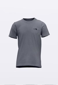 Šedé tričko s krátkym rukávom vyrobené z textúrovanej látky. Má okrúhly výstrih a malý čierny logotyp na ľavej hornej strane hrudníka.