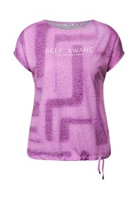 Lilla kortærmet t-shirt med et tekstureret mønster, der har teksten "SELVFORNEMMELSE find din indre fred" i hvid. Justerbar snor i kanten.