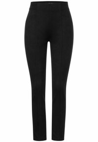 Pantaloni neri aderenti realizzati in tessuto morbido, caratterizzati da una superficie liscia, una vita elasticizzata e cuciture decorative lungo i lati.