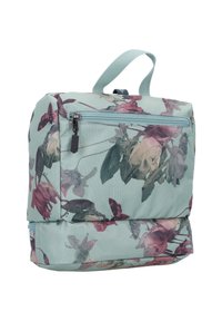 Zaino con motivo floreale su base verde menta, dotato di tasca frontale con zip e maniglia resistente per il trasporto. Realizzato in tessuto durevole.