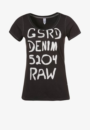 Black t-shirt made of cotton with short sleeves, featuring white, handwritten style text "GSRD DENIM 5204 RAW" in bold lettering.