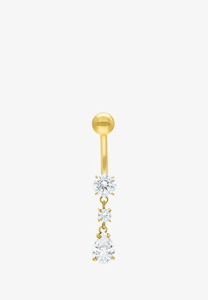 Goldener Bauchnabelpiercing mit drei klaren Edelsteinen in runden und tropfenförmigen Formen, die vertikal hängen.