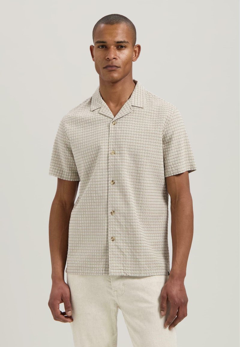 Korte mouwen overhemd met knopen in beige met een textuurpatroon in een raster, voorzien van een camp collar en lichtgekleurde knopen.