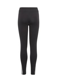 Leggings neri con vita alta, caratterizzati da strisce laterali bianche. Texture liscia e design aderente per comfort e flessibilità.