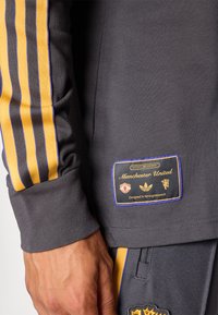 adidas Originals MANCHESTER UNITED ICON - Klub merchandise - utility black