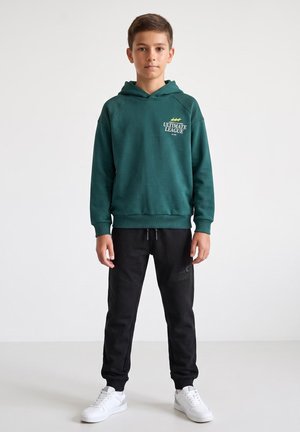 Blue Seven, BLUE SEVEN JOGGINGHOSE - Tracksuit bottoms - - schwarz