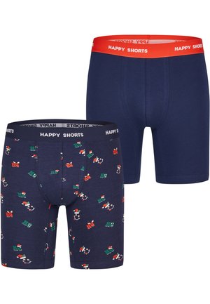 Twee paar herenboxers: één effen marineblauw met een rode tailleband, de andere met een patroon van feestelijke ontwerpen in groen, rood en wit.