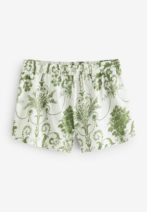 Zöld virágmintás rövidnadrág, rugalmas derékpánttal, puha anyagból, részletes mintákkal fehér háttéren.
