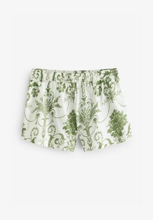 Zöld virágmintás rövidnadrág, rugalmas derékpánttal, puha anyagból, részletes mintákkal fehér háttéren.
