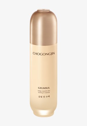 Hohe beige und goldene Hautpflegeflasche mit der Aufschrift „CHOGONGJIN GEUMSUL“ und dem Text „Hilft, nährstoffarme Haut zu pflegen.“