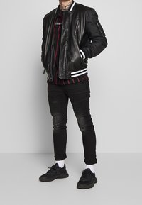 Kings Will Dream Long sleeved top - black