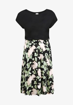 Must mustriga ümara kaelusega, mis on sobitatud lillemustriga seeliku külge, millel on mustal taustal rohelised lehed ja roosad lilled.